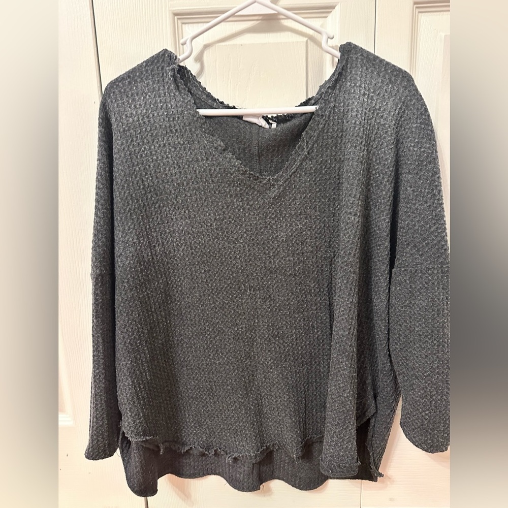 Out from under oversized v neck sweater